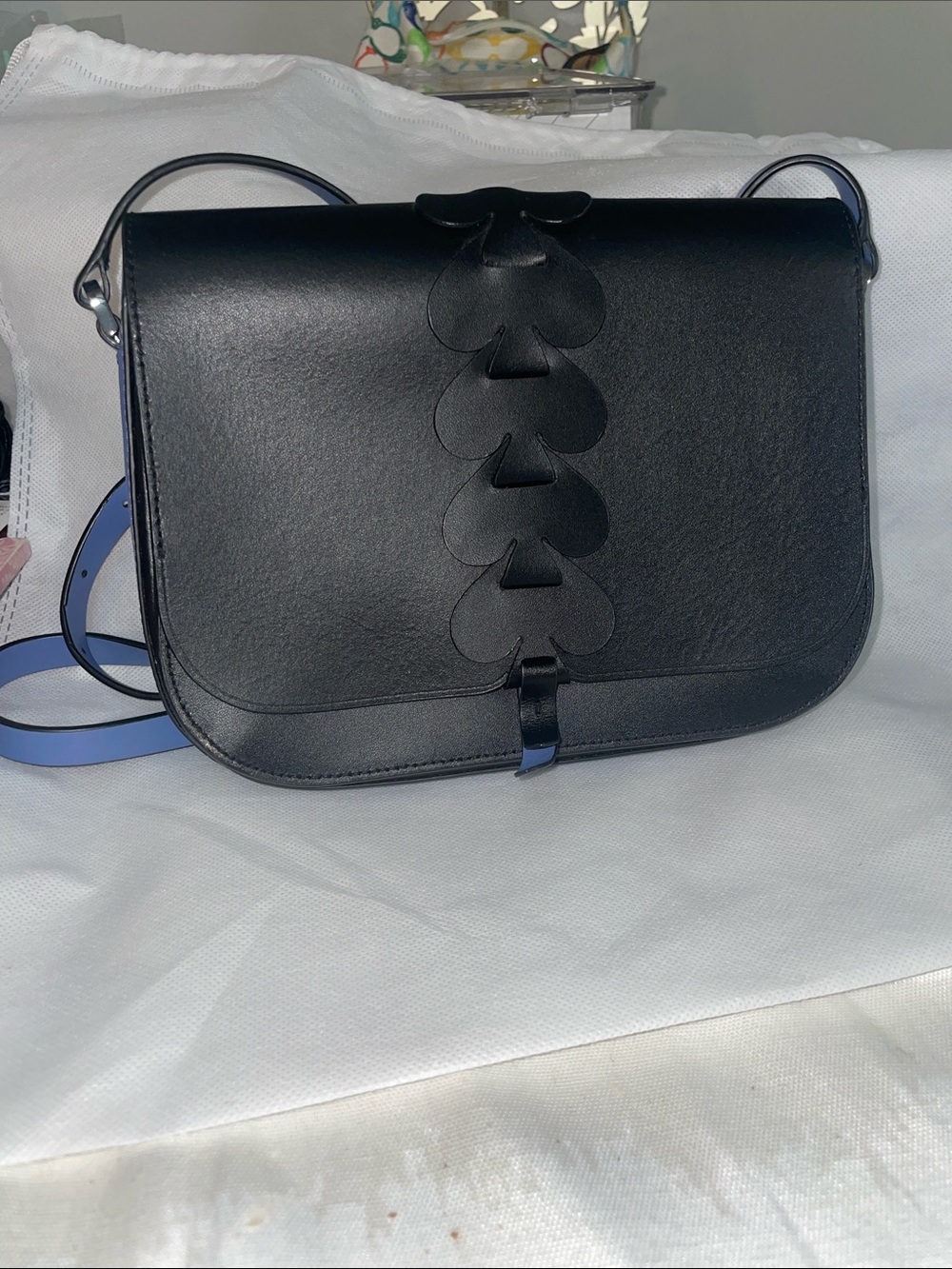 kate spade Black Leather Crossbody with Spade Petal Accent and Blue Strap